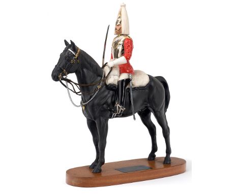 Beswick China figure of a Mounted Trooper of the Life Guards.  This finely executed ceramic figure displays a Trooper of the 