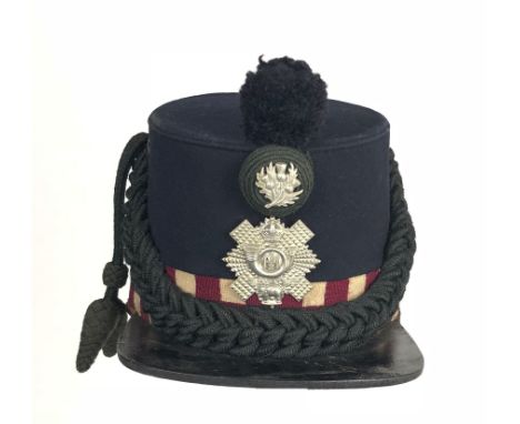 Highland Light Infantry 1900 shako.  Good dark blue body with diced band red-white-red and red-green-red. To the front, a whi