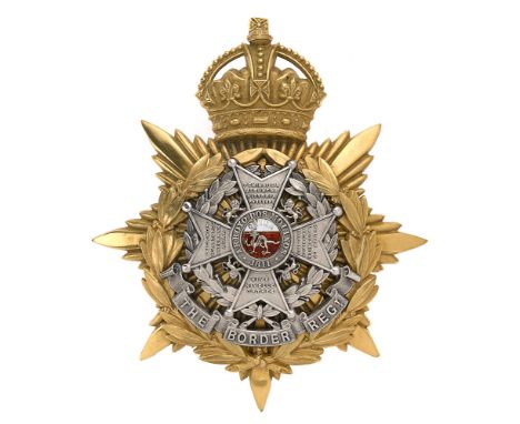 Badge. Border Regiment Officer's helmet plate circa 1901-14.  Fine scarce gilt crowned star mounted with silver Bath cross wi