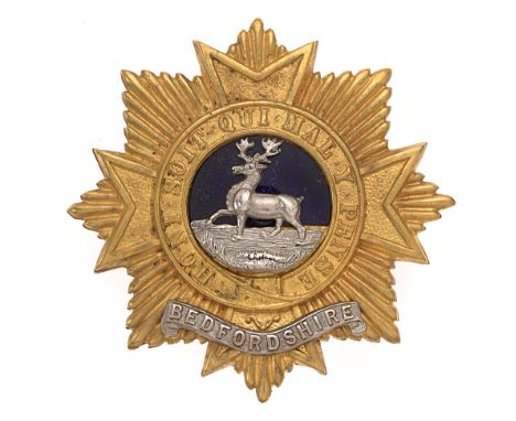 Bedfordshire Regiment Victorian post 1881 Office's forage cap badge. Fine die-stamped gilt Maltese cross superimposed on eigh