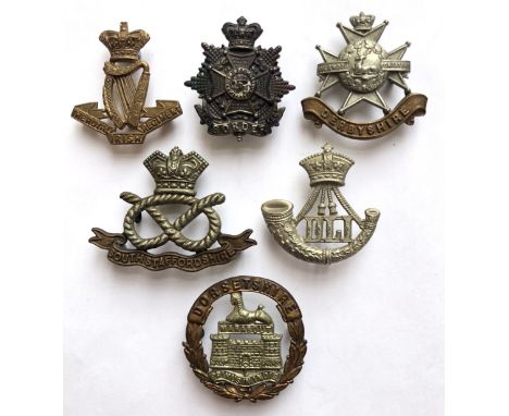 6 Victorian Infantry cap badges.  Royal Irish ... Border ... Derbyshire ... South Stafford ... Durham Light Infantry DLI ... 