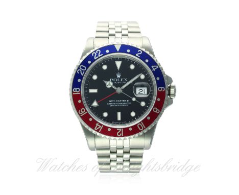 A GENTLEMAN'S STAINLESS STEEL ROLEX OYSTER PERPETUAL DATE GMT MASTER II BRACELET WATCH DATED 1994, REF. 16710, WITH ORIGINAL 