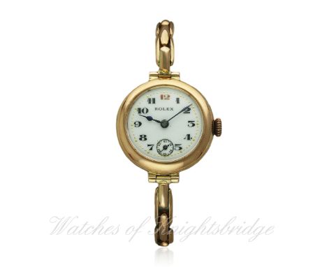 A LADIES 9CT SOLID GOLD ROLEX BRACELET WATCH CIRCA 1920s
D: White enamel dial with applied Arabic numerals, subsidiary second