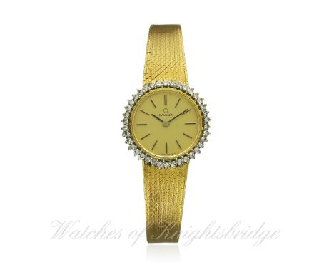 A LADIES 18K SOLID GOLD & DIAMOND OMEGA BRACELET WATCH CIRCA 1977, REF. 611-7280
D: Champagne dial with black inlaid gilt bat