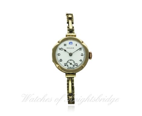 A LADIES 9CT SOLID GOLD ROLEX BRACELET WATCH CIRCA 1920s
D: White enamel dial with applied Arabic numerals, subsidiary second