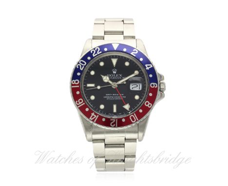 A GENTLEMAN'S STAINLESS STEEL ROLEX OYSTER PERPETUAL DATE GMT MASTER BRACELET WATCH CIRCA 1985, REF. 16750 "TRANSITIONAL" MOD