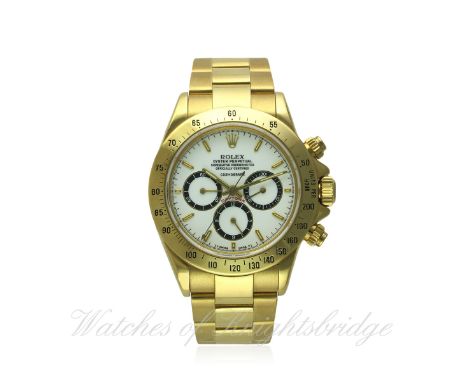A FINE & RARE GENTLEMAN'S 18K SOLID GOLD ROLEX OYSTER PERPETUAL COSMOGRAPH DAYTONA BRACELET WATCH CIRCA 1988, REF. 16528 "FLO