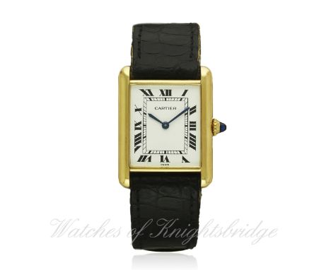 A GENTLEMAN'S 18K SOLID GOLD CARTIER PARIS TANK WRIST WATCH CIRCA 1970s
D: White dial with applied Roman numerals & inner min