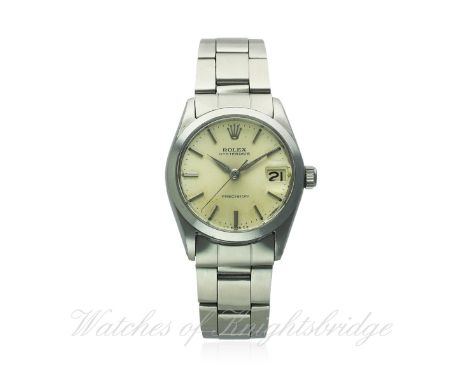 A MID SIZE STAINLESS STEEL ROLEX OYSTERDATE PRECISION BRACELET WATCH CIRCA 1962, REF. 6466
D: Silver dial with silver batons 