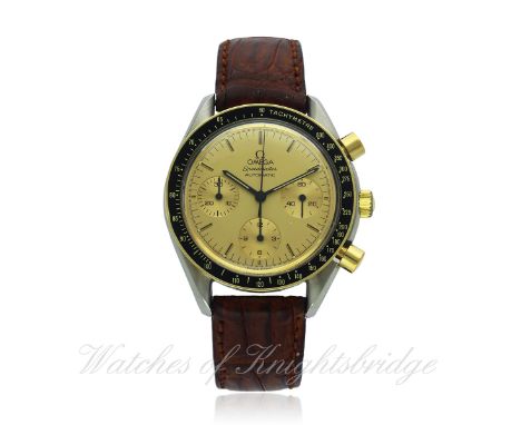 A GENTLEMAN'S STEEL & GOLD OMEGA SPEEDMASTER AUTOMATIC CHRONOGRAPH WRIST WATCH DATED 1989, REF. DA 175.0032 WITH OMEGA BOX & 