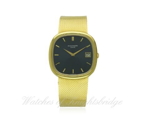 A FINE GENTLEMAN'S 18K SOLID GOLD PATEK PHILIPPE AUTOMATIC DATE BRACELET WATCH CIRCA 1970s REF. 3604-4
D: Blue "sunburst" dia