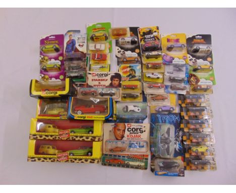 A quantity of TV and Movie themed diecast to include Corgi, Mattel Hot Wheels and Dreamworks all in original packaging (44)
