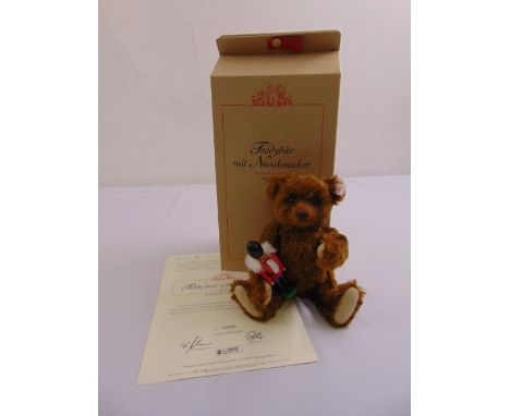 Steiff Teddy Bear with Nutcracker 037955 with white tag, certificate and original packaging