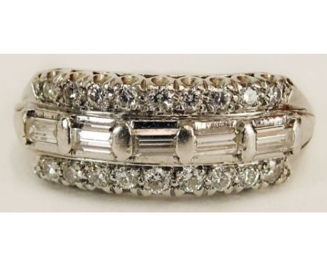 Lady's Vintage approx. 1.0 Carat Round and Baguette Cut Diamond and Platinum Ring. Diamonds G-H Color, VS Clarity. Signed Pla