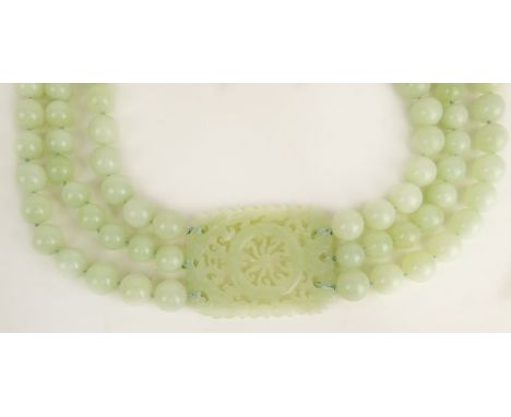 Chinese Three Strand Celadon Jade Bead Necklace with Carved Celadon Jade Panel (later added costume clasp). Unsigned. Good Co