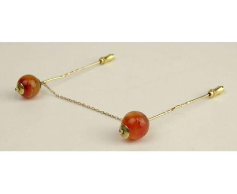 Vintage 14 Karat Yellow Gold and Carnelian Bead Double Stick Pin. Unsigned. Good Condition. Carnelian Beads Measure 13mm. Eac