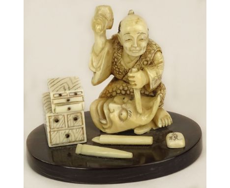 Miniature Hand Carved Ivory Antique Japanese Figurine. "The Mask Maker" Finely Detailed. Signed. Good Condition. Measures 2 I