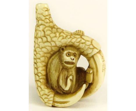 Vintage Japanese Ivory Netsuke. "Monkey in Claw" Signed. Good Condition. Measures 1-3/4 Inches Tall. This item will only be s