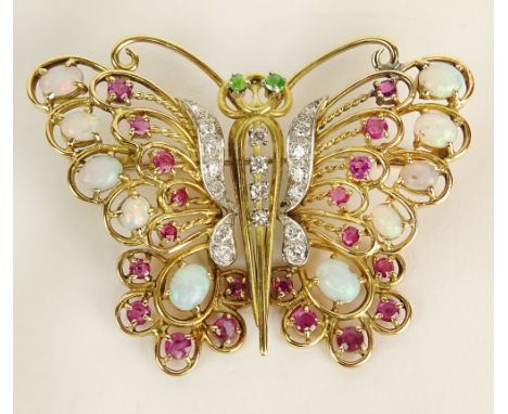 Lady's Vintage 18 Karat Yellow Gold Butterfly Brooch with White Opal, Round Cut Ruby, Round Cut Diamond and Emerald Accents. 