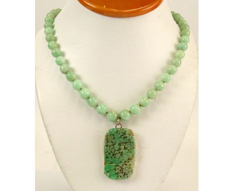 Lady's Vintage Chinese Graduated Celadon Jade Bead Necklace with Carved Celadon Jade and 14 Karat Yellow Gold Pendant. Unsign