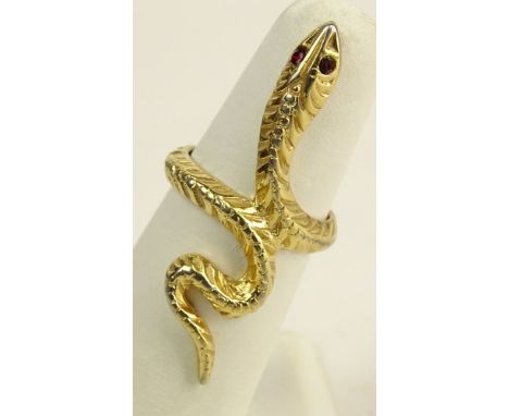 Vintage 18 Karat Yellow Gold Snake Ring with Ruby Eyes. Signed 18K. Good Condition or Better. Ring Size 7. Approx. Weight: 3.