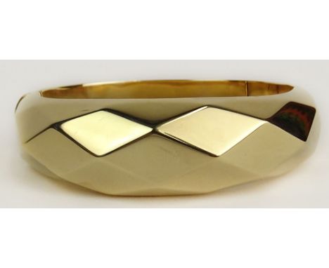 Vintage 14 Karat Yellow Gold Hinged Bangle Bracelet. Signed 14K. Very Good Condition with Box. Measures 7/8 Inch Wide, Interi