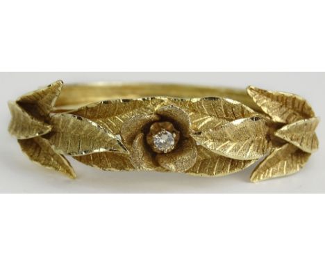 Vintage 14 Karat Yellow Gold Cuff Bangle with Relief Leaf Design and approx. .20 Carat Diamond. Signed 14K. Good Condition. M