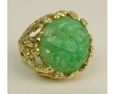 Vintage Carved Green Jade and 14 Karat Yellow Gold Ring. Jade Measures 19mm Diameter. Signed 14K. Good Condition or Better. R