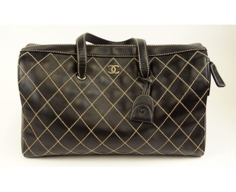From a Palm Beach Socialite, A Large Chanel Surpique Wild Stitch Tote Bag. Goldtone CC Logo On Front, Stamped Chanel Zipper P