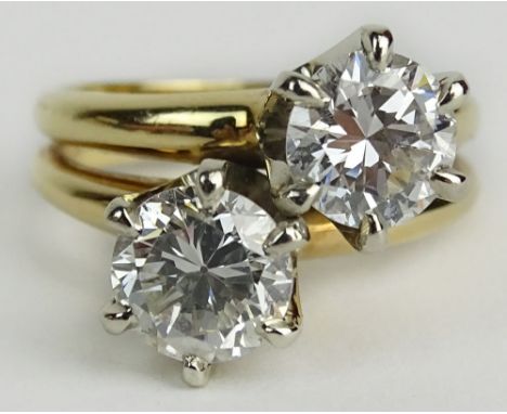 Lady's Vintage approx. 2.0 Carat Round Cut Diamond and 14 Karat Yellow Gold Crossover Ring. Diamonds G-H Color, VS Clarity. S