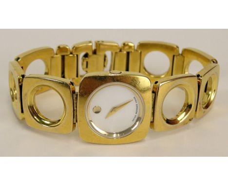 Lady's Vintage Movado Gold Tone Bracelet Quartz Watch with Mother of Pearl Dial. Running. The Gallery does Not warranty the r