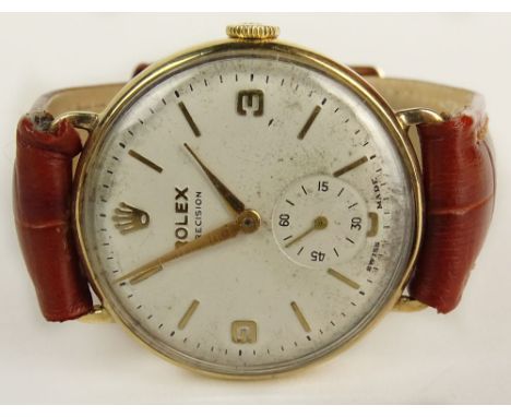 Vintage Rolex 9 Karat Yellow Gold Watch with Leather Strap. Model #12868, Serial #338453. Case Stamped 375. Case Measures 31m
