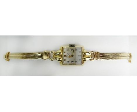 Lady's Vintage Elgin 14 Karat Yellow Gold Bracelet Watch. Signed 14K. Surface Wear from Normal Use. Does Not appear to be run