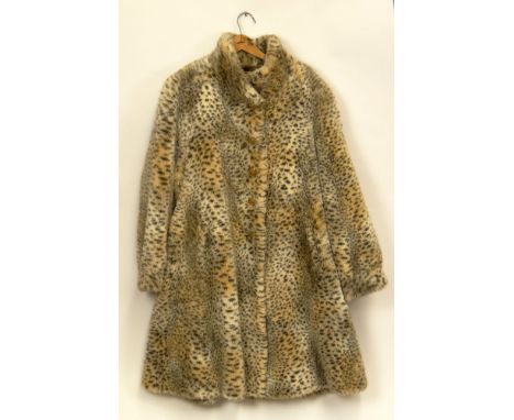 St. John by Marie Gray "Cheetah" Faux Fur Coat. Lined. Button Front. Size 10. Good condition. Label: St. John by Marie Gray, 