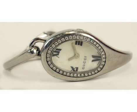Lady's Vintage Gucci Model 103 Collection Stainless Steel Quartz Watch with Diamond Bezel and Mother of Pearl Dial. Surface W