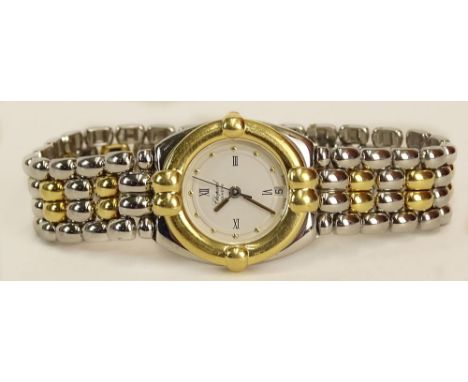 Lady's Vintage Chopard 18 Karat Yellow Gold and Stainless Steel Gstaad Watch with Quartz Movement. Model #328116, Serial #GD1