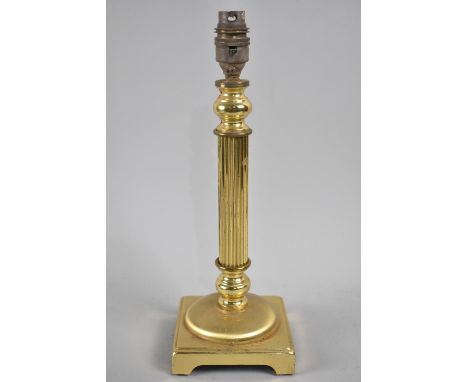 A Mid 20th Century Brass Table Lamp in the Form of a Ribbed Column, 34cms High 