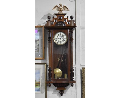 A Late 19th/Early 20th Century Eight Day Twin Weight Vienna Wall Clock with Shaped Pediment Mounted with Eagle Finial, Glazed