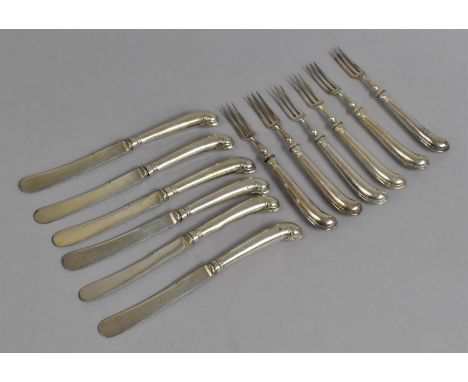 A Set of Silver Pistol Grip Handled Trident Fish Forks and Knives 