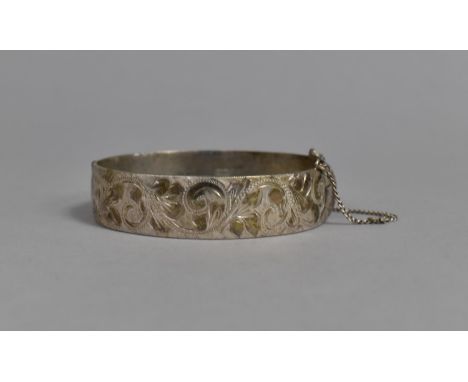 A Heavy Vintage Silver Hinged Bangle with Etched Foliate Decoration, Birmingham 1966, 48.8gms 