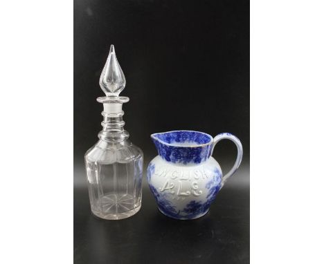 A mid 19th century pottery ale jug, blue transfer decoration, cast "English Ale XXX", impressed to base, "Published by John K