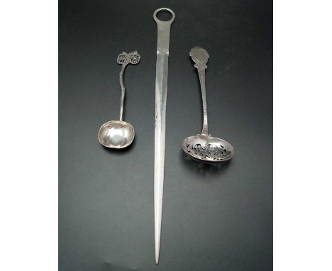 Thomas Wallis &amp; Jonathan Hayne, a George III silver meat skewer, London 1810, together with a George Unite Victorian sift