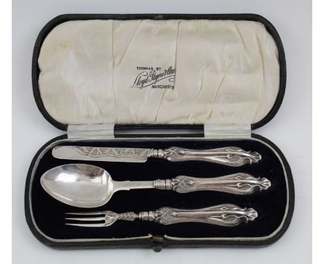 George Unite, a silver three-piece presentation Christening set, comprising; spoon, fork, and knife, cased in a Manchester Re