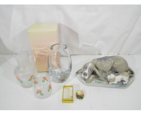 Lot to include a Nao figurine, Polish glass vase and similar. (4)