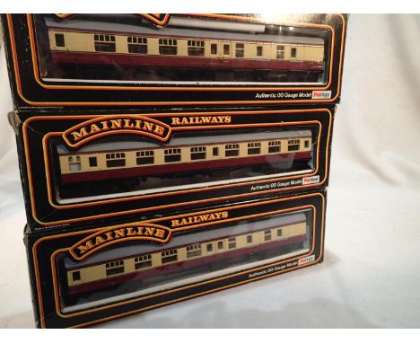Three Mainline crimson/cream coaches, two brake ends, one comp, excellent condition, boxes are good. UK P&amp;P Group 1 (£16+
