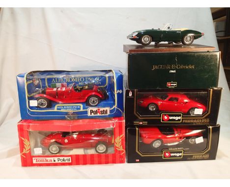 Five 1/18 scale diecast vehicles, Polistil Maserati 250 F, Alfa 6C, Burago Ferrari 250 Testa Russa, 250 Leman, and Jaguar E t