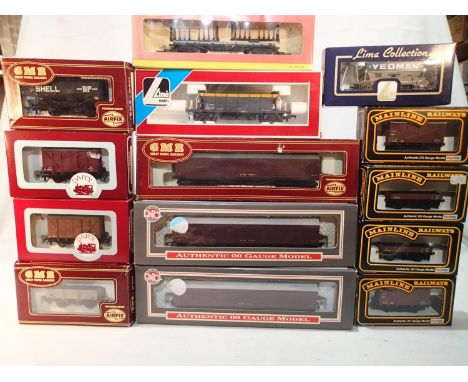 Thirteen assorted OO scale boxed wagons, Dapol, Airfix, Hornby, Mainline, Lima, mostly very good condition, wear to boxes. UK