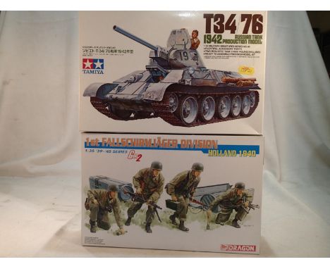 Two 1/35 scale military related kits, Tamiya T34 Russian tank 1942, and Dragon 1st Fallschirmjager division 1940, both sealed