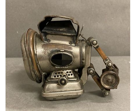 An antique Joseph Lucas Silver King Kerosene bicycle lamp 