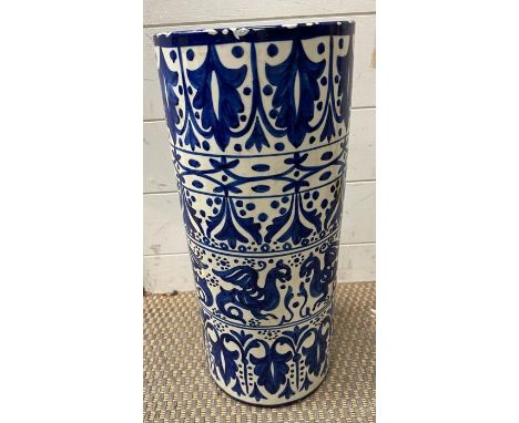 A blue and white ceramic stick stand
